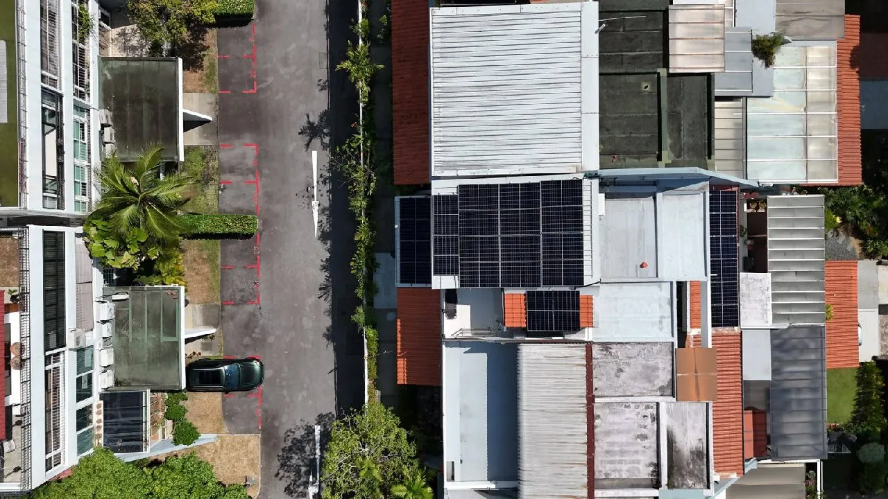 Aerial view of rooftop solar panels on a landed home in Singapore