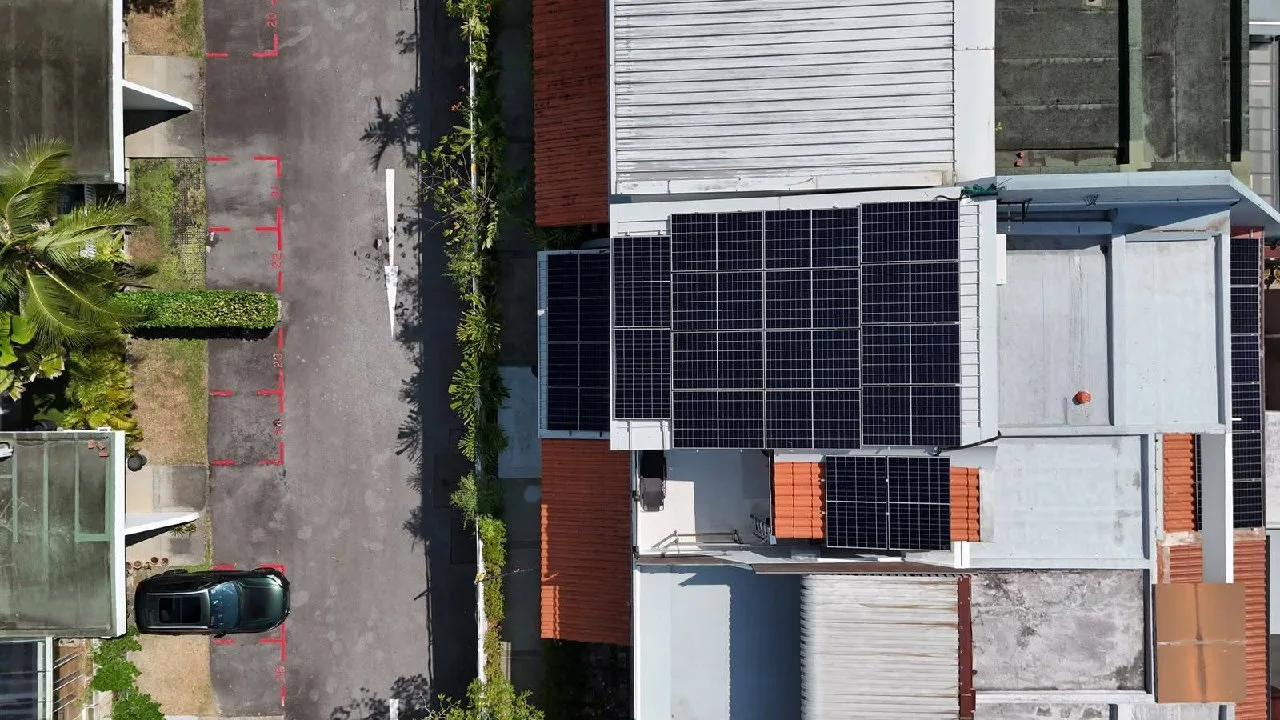 Rooftop solar array on a landed home along a residential street in Singapore